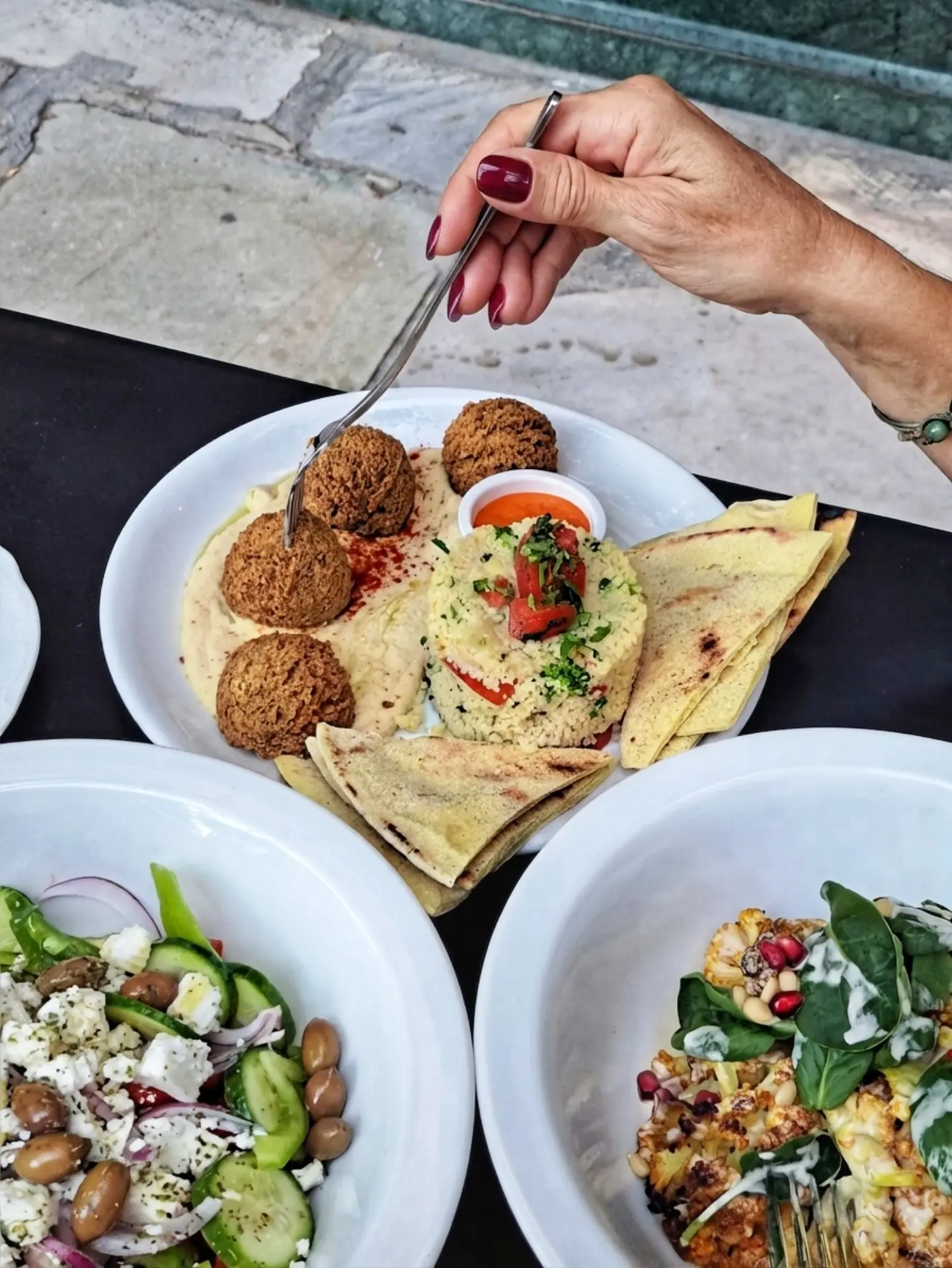 Plates shared on a table, seen from above